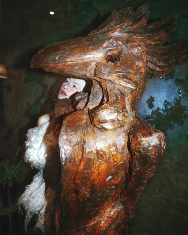 Where mythology meets legacy.⁠
⁠
“The Cockerel”, carved in wood by the brilliant Bushra Fakhoury, artist and a guiding spirit of The Mandrake since day one.⁠
⁠
A powerful symbol of transformation, ancestry, and the wild beauty that lives between worlds.⁠

Artwork by @bushrafakhoury 
⁠
Photo credits⁠
Concept & Pic @brujaopala⁠
Muse @laylaoresme⁠
Styling @pavelanuska⁠
Dress @lizandroacera 
MUA @tmeasto⁠
Production @andressaclaas